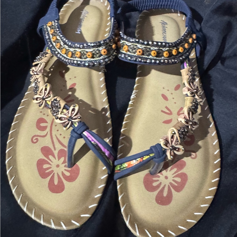 Colorful and sparkly Ablanczoom sandals.
